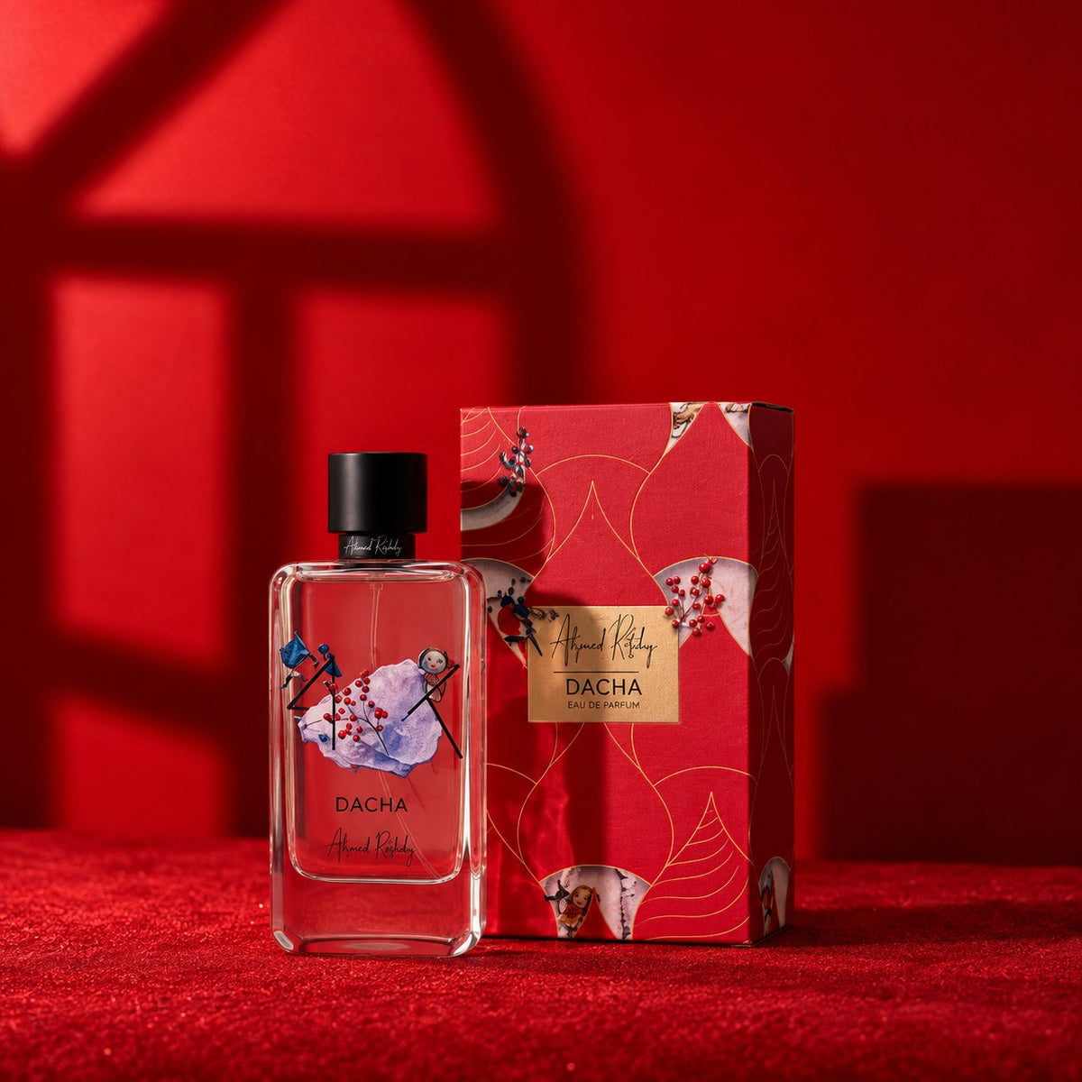 Dacha d'Alfred Ritchy, eau de parfum 100 ml, flacon et son coffret rouge et or sur fond rouge.