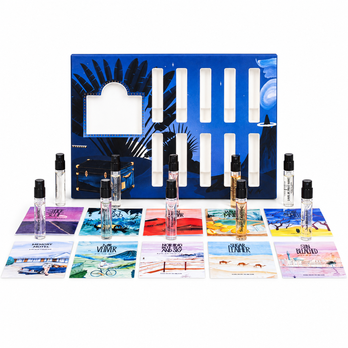 Coffret Découverte de Une Nuit Nomade, fioles de 2,5 ml et cartes illustrées devant le coffret ouvert, sur fond blanc.