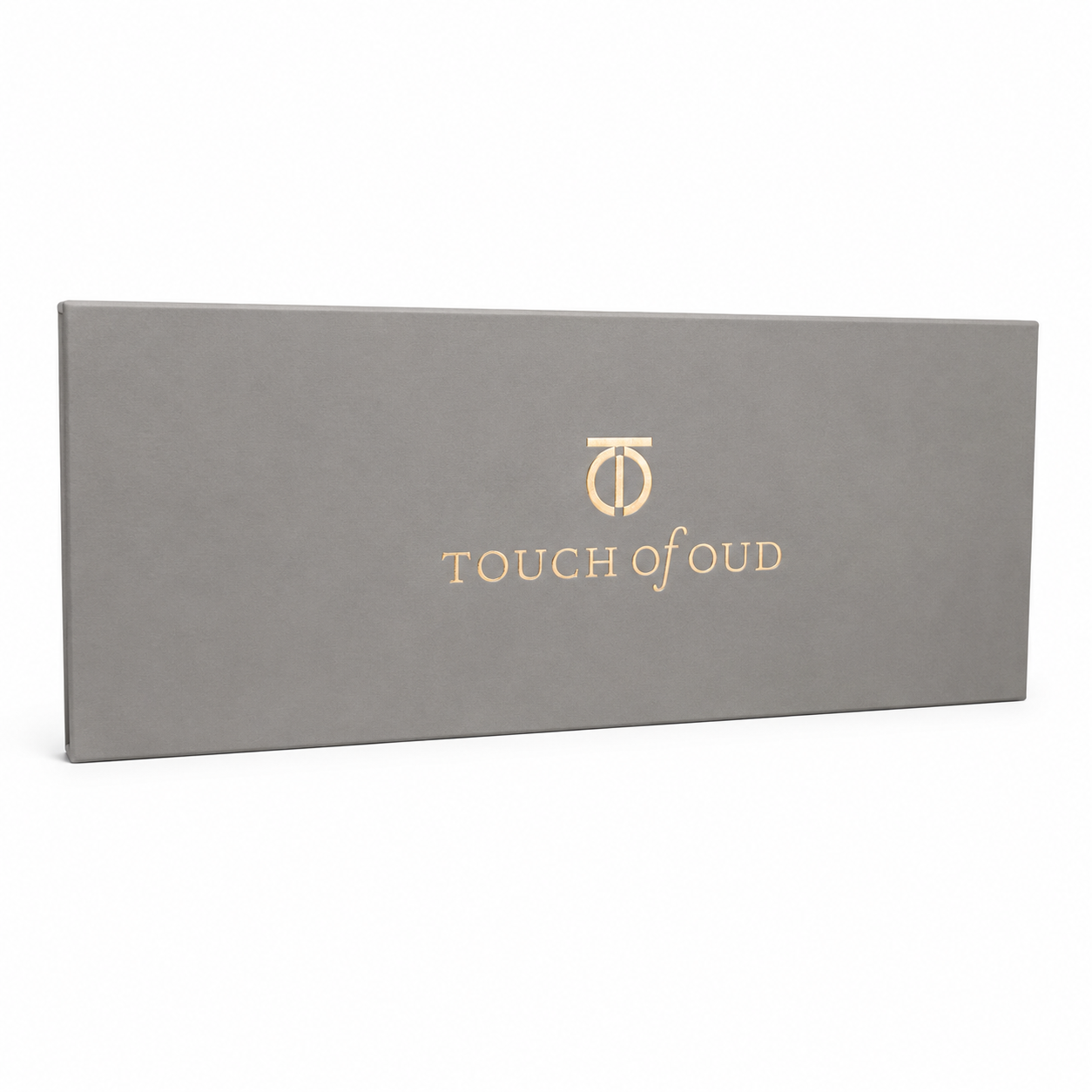 Coffret découverte Touch of Oud, les 7 fioles de 2 ml alignées sur fond blanc.