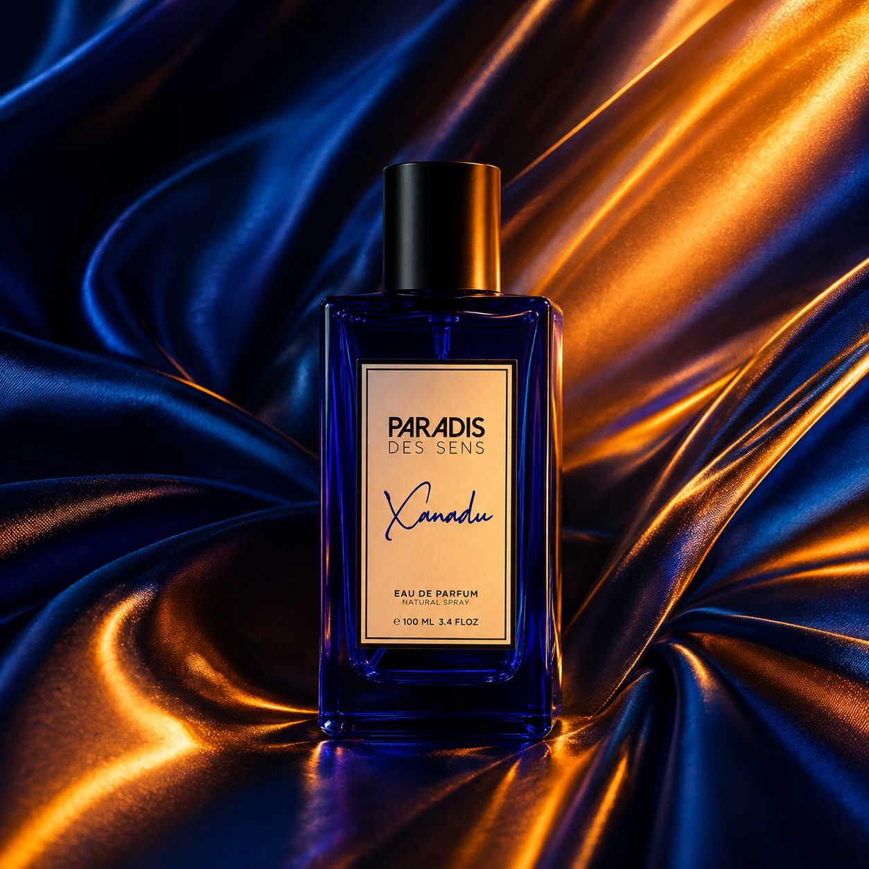 Xanadu de Paradis des Sens, eau de parfum 100 ml, flacon bleu en mise en scène.
